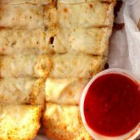 Garlic Cheese Bread (8 Pcs) · 140 Cal/Piece. Bellacino's grinder bread covered with cheese and garlic spread. Served with ...
