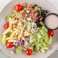 “All-In” Chopped Salad · Lettuce, romaine, bacon, roasted chicken breast, cherry tomatoes, cucumbers, pasta, red onio...