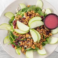 Harvest Salad · Spinach, romaine, dried cranberries, candied walnuts, crumbled blue cheese, green apple, ras...