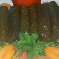 Veggie Grapeleaves · Grapeleaves stuffed with tomatoes, parsley, onion, rice, lemon. 5 pc in small, 10 pc in large
