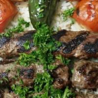 Shish Kofta · Char-broiled ground meat mixed with parsley and onion.