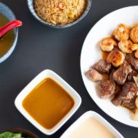 Steak And Shrimp Hibachi Lunch · Served with salad, vegetable fried rice, or steamed rice.

Items are cooked to order and may...
