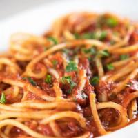 Spaghetti Marinara · Spaghetti, marinara, parmesan garnish.