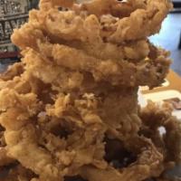 Breaded Onion Rings · Homemade and deep fried to golden perfection. The best in town.