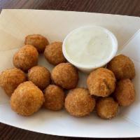 Breaded Fried Mushrooms · Served with ranch dressing.