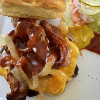 Hickory Bacon Cheeseburger · 1/3 pound grilled burger with American cheese, bacon, bbq sauce, grilled onions, ketchup, mu...