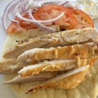 Chicken Pita Combo Meal · Grilled chicken breast served on a warm pita. Served with fries and your choice of drink.