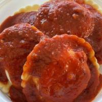 Ravioli Dinner Combo Meal · Four large stuffed cheese raviolis.  Comes with bread and butter. Served with fries and your...
