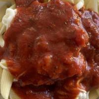 Hearty Homemade Mostaccioli · Our mostaccioli is cooked al-dente and covered with our homemade meat marinara sauce and top...