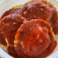 Stuffed Cheese Ravioli · Large ravioli stuffed with ricotta cheese and topped with our marinara sauce. Includes bread...