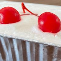 Tres Leches Cake 14Oz  · Sponge cake soaked in condensed, evaporated and whole milk. Our specialty!