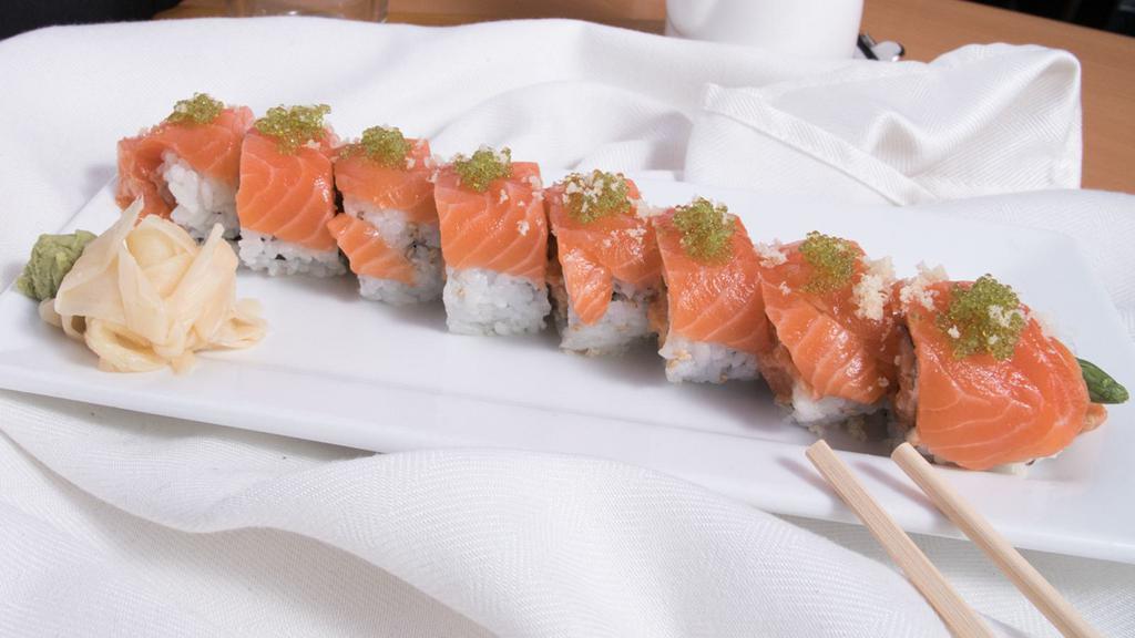 Sunny Roll (8Pc) · Spicy salmon, asparagus topped with salmon, wasabi tobiko, tempura flake