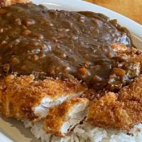Japanese Curry · Chicken breast panko crusted and fried, carrot and onion in a mild curry sauce, served over ...