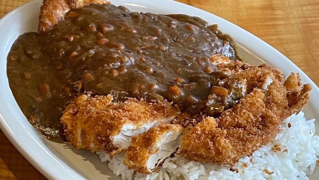 Japanese Curry · Chicken breast panko crusted and fried, carrot and onion in a mild curry sauce, served over rice