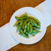 Edamame · Steamed soybeans topped with salt.