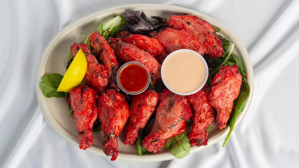Chicken Wings (12 Pcs) · Contains dairy, mild. Wing’s cooked in tandoor (clay oven).