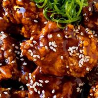 Spicy Korean Chicken Nugget · Boneless chicken wing style chicken nuggets with sweet and spicy Korean BBQ sauce and sesame...