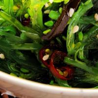 Seaweed Salad · Japanese seaweed over crispy cucumbers with sweet vinaigrette dressing.