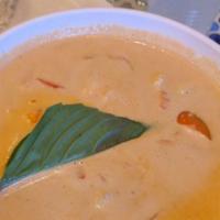 Panang Curry · Panang curry simmered with carrot, bell pepper, coconut milk and fresh basil leaves. Spicy.