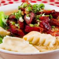 Dumpling Noodles · Stuffed shrimp dumpling, Chinese broccoli, bean sprouts, egg noodles and BBQ pork. Served in...