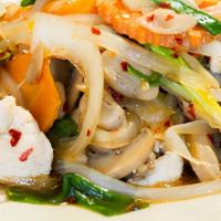 Ginger Entrée · Stir-fried chicken sauteed with shredded ginger, onion, straw mushrooms, carrots and dry hot...