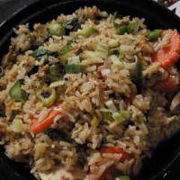 Spicy Fried Rice  · Stir fried rice with egg, green beans, carrots, basil leaves and jalapenos in a spicy green ...