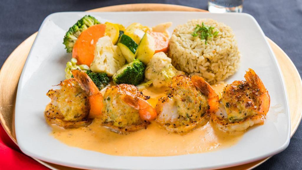 Stuffed Shrimp · Jumbo shrimp stuffed with crab meat, served with light thermidor sauce