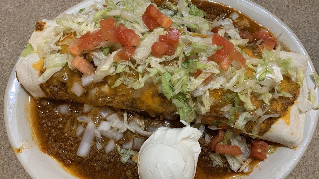 All Meat · Chile verde spicy pork chunks rolled in a large flour tortilla. (pictured all meat deluxe)