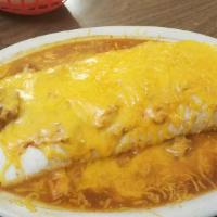 Ground Beef Burrito · Seasoned ground beef and pinto beans rolled in large flour tortilla. ( pictured with cheese ...