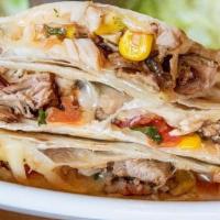 Chicken Quesadilla · Crisped flour tortilla with melted Chihuahua cheese, chipotle grilled chicken, roasted corn ...
