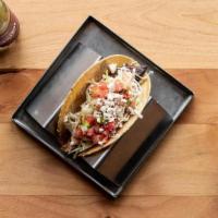 Grilled Baja Fish · Wood-fire grilled tilapia – chipotle baja sauce, shredded cabbage, pico de gallo, and queso ...
