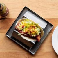 Blt Taco · Beer battered bacon, chipotle aioli, avocado, shredded lettuce and pickled tomatillos on flo...