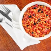 Bumblebee Stew · Sweet corn, stewed tomatoes, onions and black beans in a sweet and spicy cream sauce. Gluten...