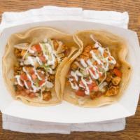 Pollo Tacos Rancheros · 4 tacos, marinated chicken topped with pico de gallo, sour cream, cotija cheese and lettuce ...
