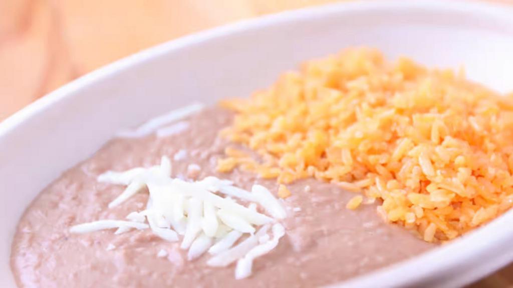 Rice And Beans · a side of Mexican rice and refried beans