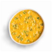 Broccoli Cheddar · Creamy vegetable soup with fresh broccoli, mild cheddar cheese, garlic, carrots, celery and ...