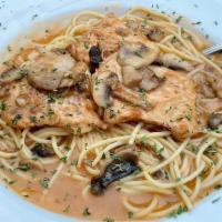 Chicken Marsala · Chicken breasts sautéed with mushrooms in a sweet marsala wine sauce over spaghetti. Sweet a...