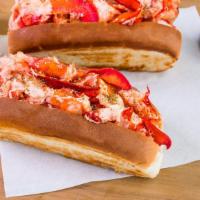 Lobster Roll · wildcaught lobster meat in a buttered & toasted bun w/ lemon butter, mayo, & seasoning.