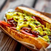 Philly Cheesesteak Sandwich With Bacon & Jalapeños · Delicious sandwich made with Beef steak, sliced jalapeño peppers, melted cheese, sautéed oni...