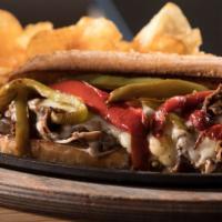 Philly Cheesesteak Sandwich With Jalapeños · Delicious sandwich made with Beef steak, sliced jalapeño peppers, melted cheese, sautéed oni...
