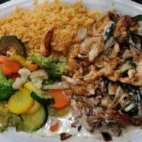 Pollo Hawaiano · Chicken grilled with green pepper, pineapple, mushrooms, onions, and topped with cheese dip,...