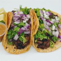 Champ Tacos · Choose your protein:
Steak, Birria, Pollo, Chorizo con Papa, Al Pastor

Toppings: Onion and ...