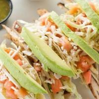 Taco Salad · Crispy flour tortilla filled with ground beef or shredded beef, or shredded chicken, cheese,...