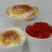Corn Large - 16 Oz · Sweet Corn Boiled to perfection on a 16oz cup. Topped with Mayonnaise, Cotija Cheese, Butter...