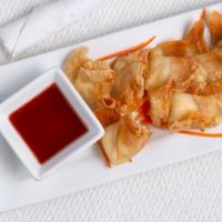Cream Cheese Puffs · Thai pastries filled with cream cheese and served with a side of sweet sauce. A delightful t...
