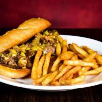 Avalanche Steak Sandwich · Tender marinated strips of steak, caramelized onions & mushrooms topped with scratch made qu...