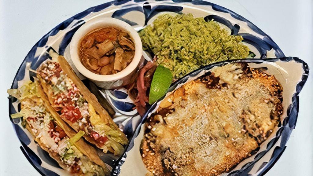 Segundo Platter · two cheese enchiladas, two gringo tacos, cilantro rice, and borracho beans.