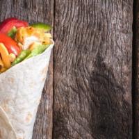 Zeus Pita Wrap · Grilled organic chicken topped with juicy tomatoes, fresh sliced cucumbers, onions, crumbled...