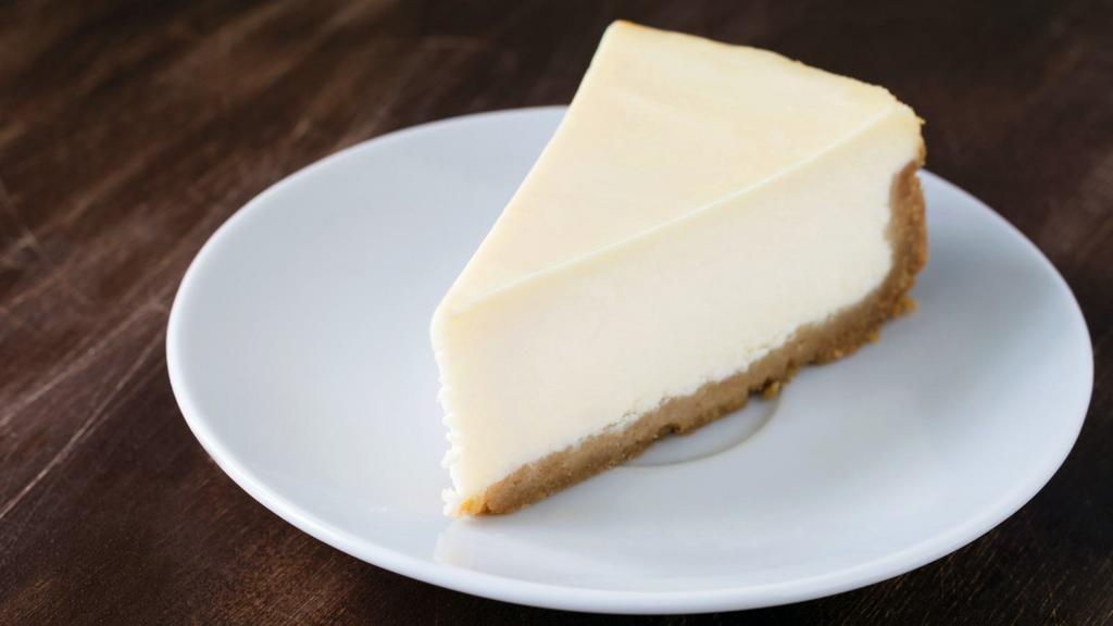 Ny Style Cheesecake · Delicious cream cheesecake with a graham cracker.
