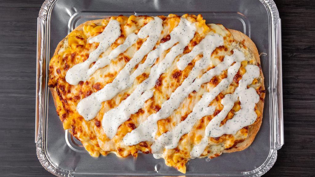 Extra Cheesy Mac Flatbread · Garlic sauce base, mozzarella, extra mac n cheese, melted cheese, garlic sauce on top